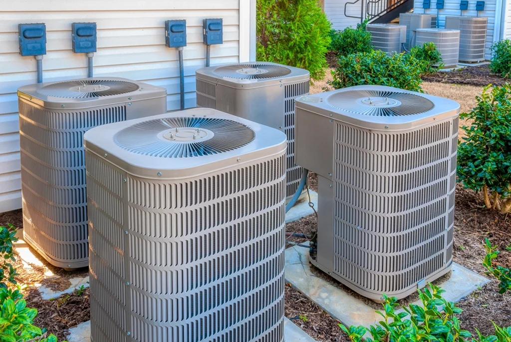 Outdoor unit making rattling sounds in Lockport LA: multiple outdoor residential air conditioning condenser units installed